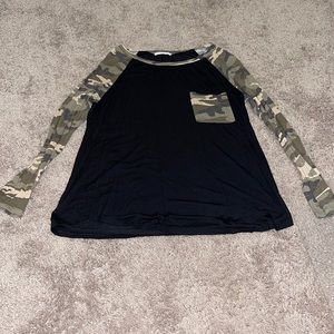 One pocket black and camp long sleeve shirt.